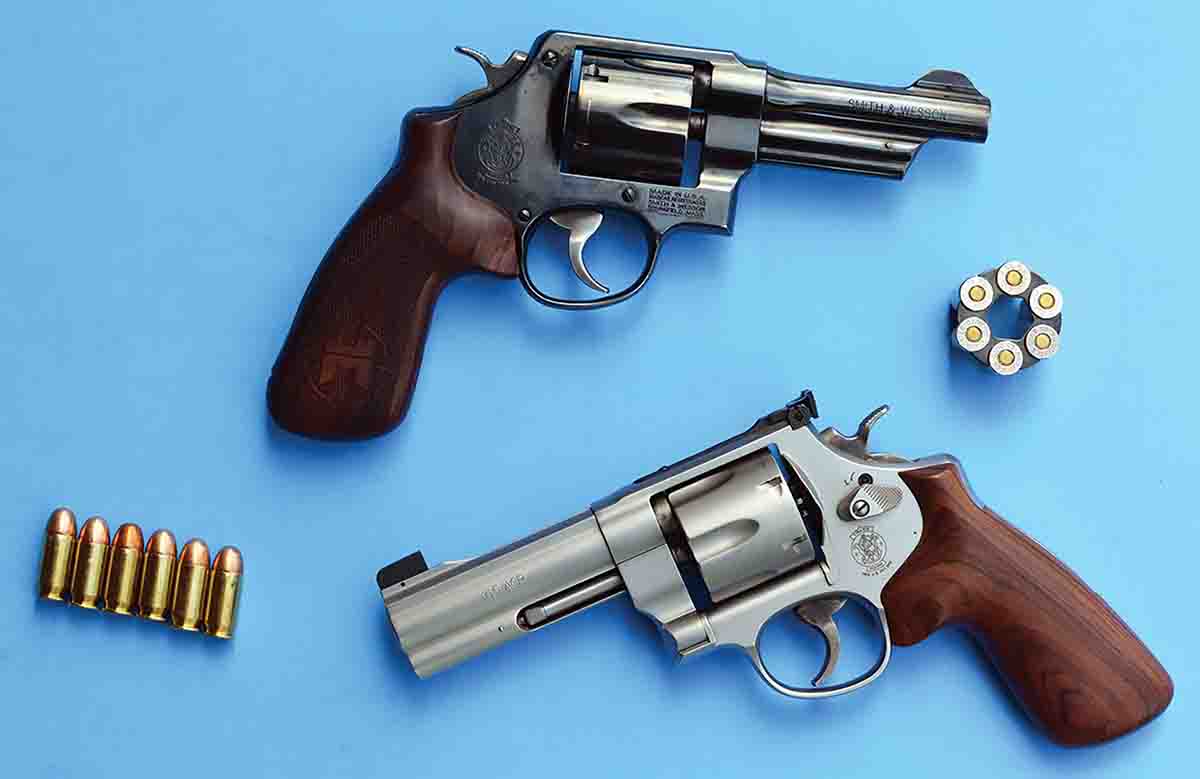 The Smith & Wesson Model 22-4 chambered in .45 ACP (top) features fixed sights and blue finish, while the popular Model 625-8 (bottom) features adjustable sights and is constructed of stainless steel.